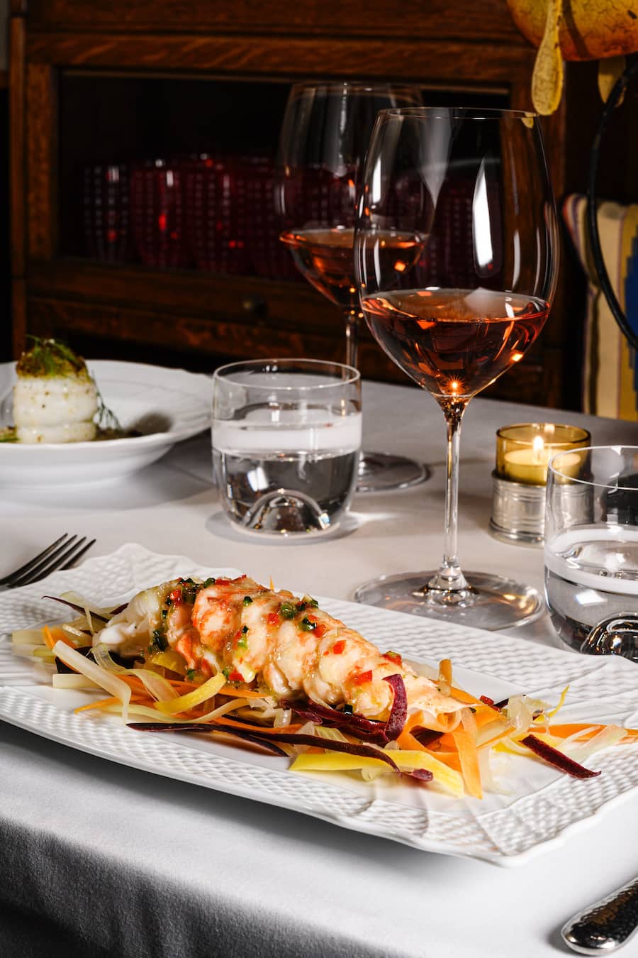 Signature Dish: Aragosta mit Gemüsejulienne.