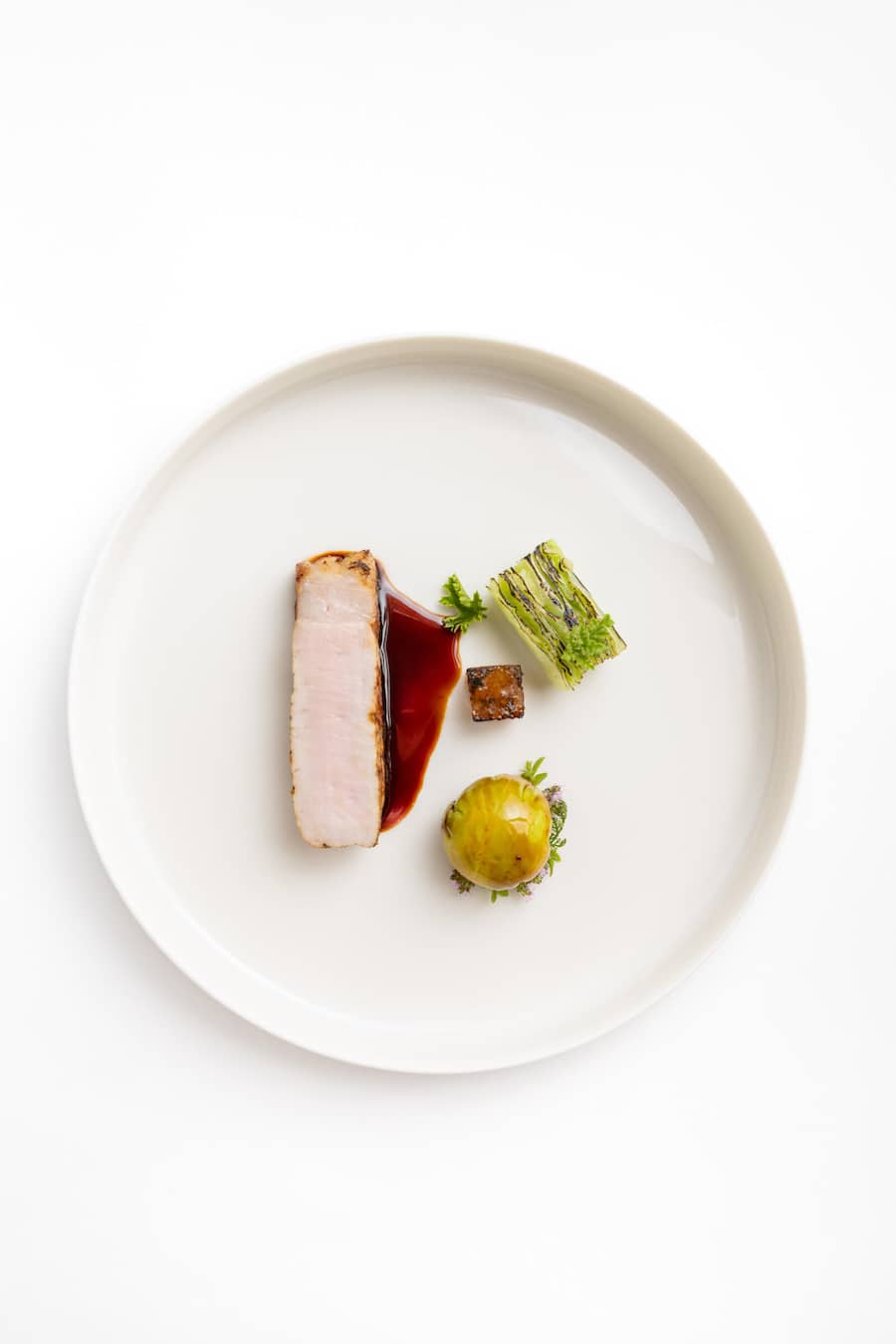 Madame Pic kennt sich auch in der Ostschweiz aus: Thurgauer Kräuterschwein, dazu Thurgauer Pinot Noir.